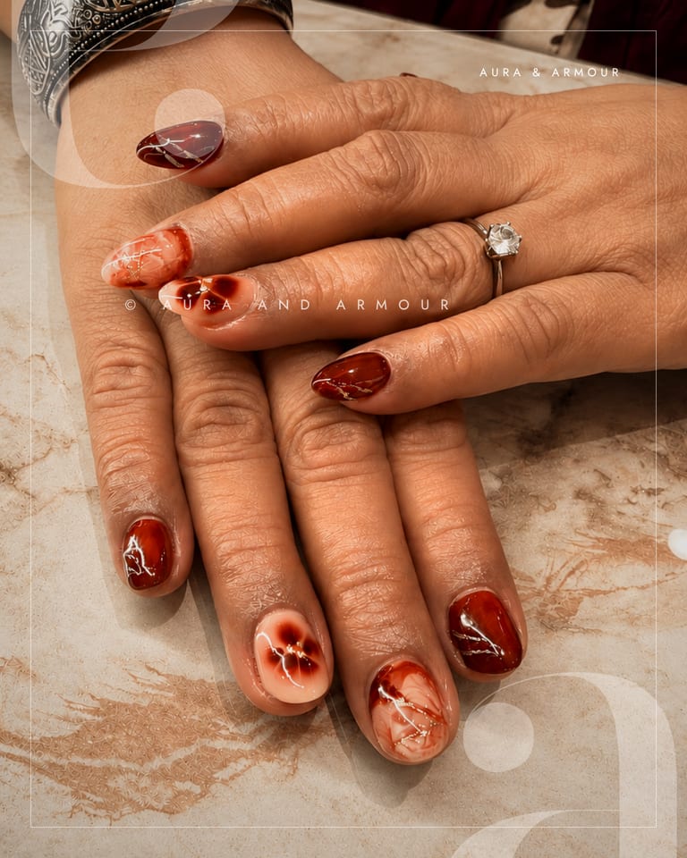 Burgundy and nude hand painted floral nails