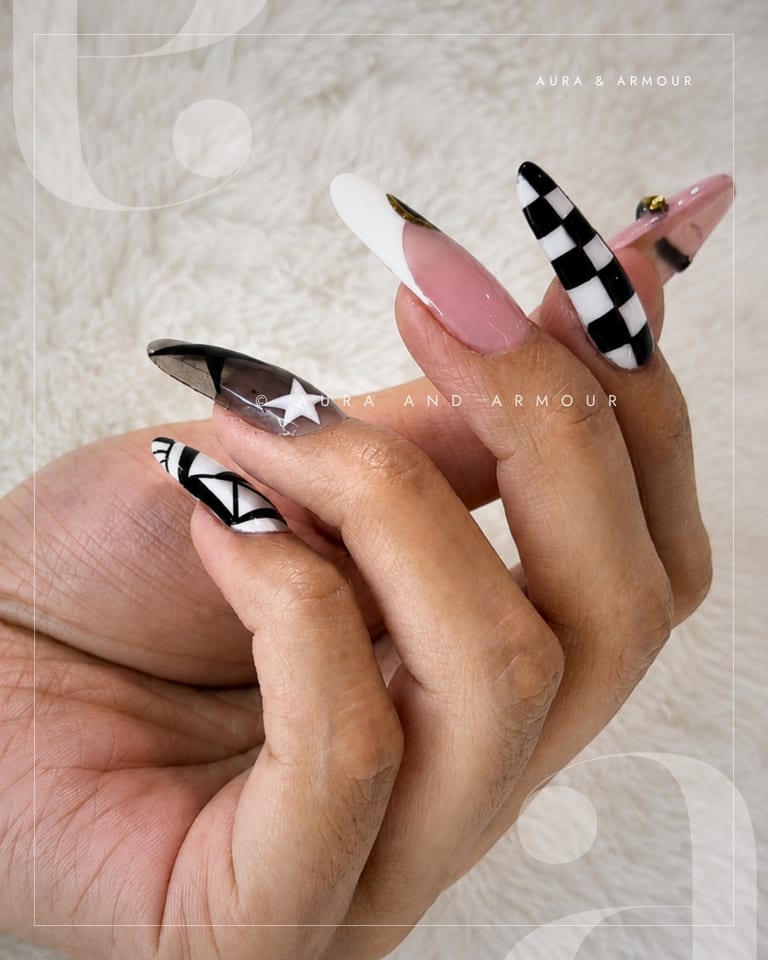 Black and white checkerboard and star nail art