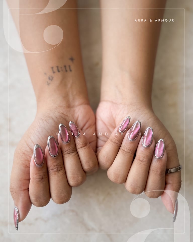 Magenta glass effect nails with chrome edges