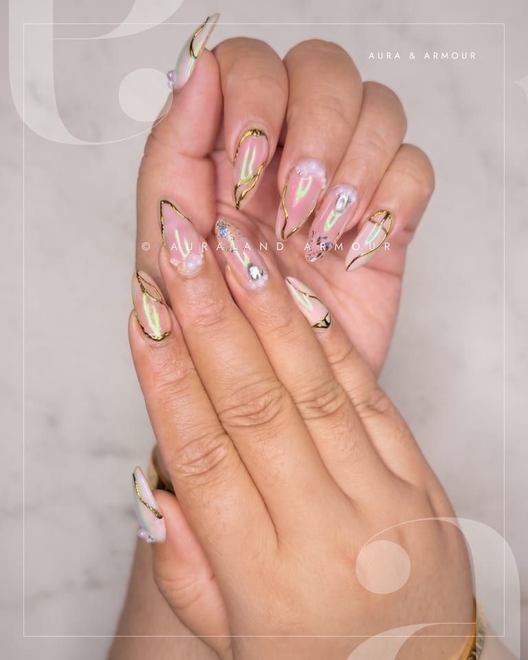 Nude almond with gold chrome lines and gems